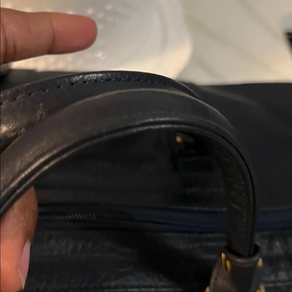 Burberrys Dark Navy Leather Bag with Embroidered Patch